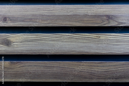 timber planks on blue background