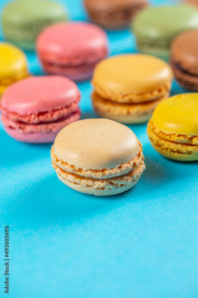 Close-up of macarons cakes of different colors .Culinary and cooking concept. Tasty colorful macaroons. Close-up of macarons cakes of different colors .Culinary and cooking concept. Tasty colorful macaroons.