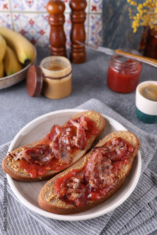 Sandwiches with peanut butter, strawberry jam and bacon