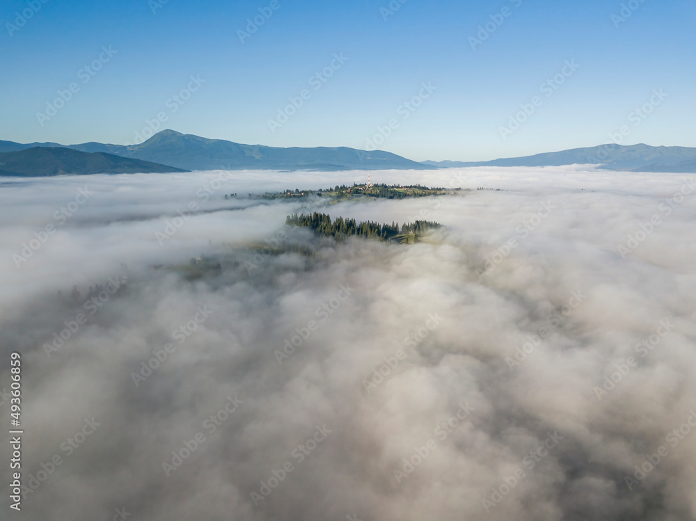 Morning fog in the Ukrainian Carpathians. Aerial drone view. Morning fog in the Ukrainian Carpathians. Aerial drone view.