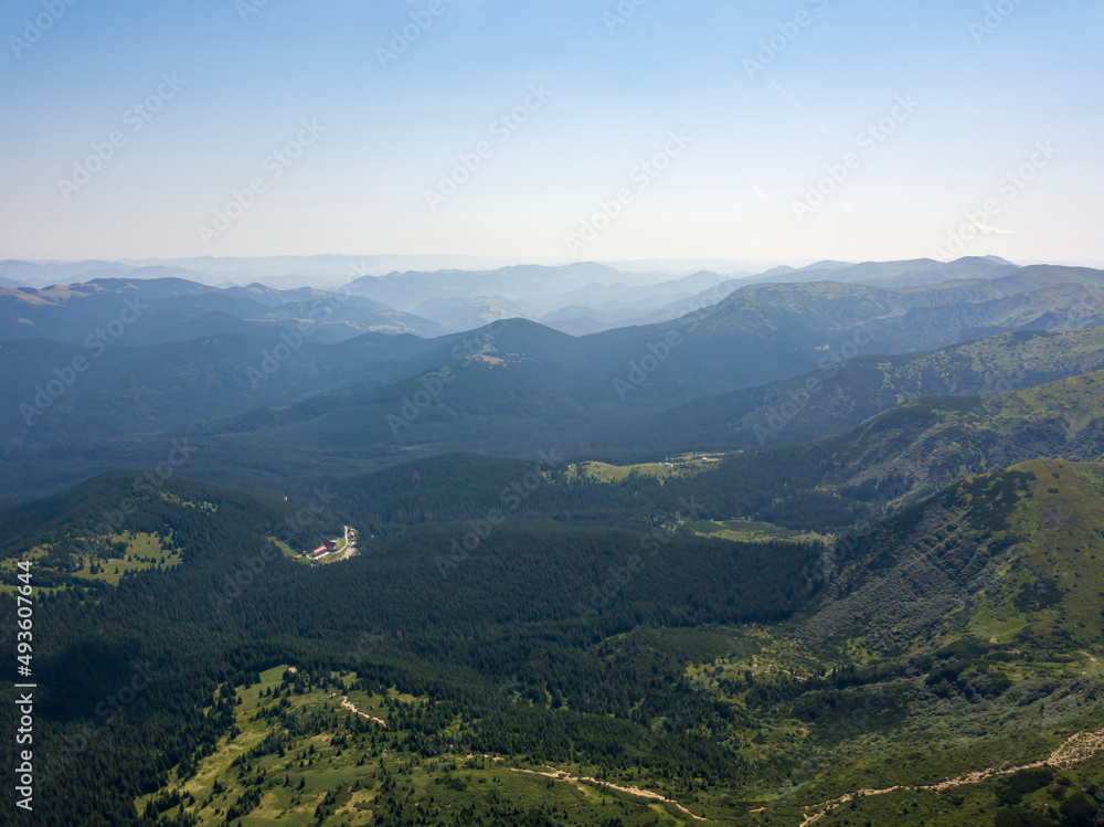 High mountains of the Ukrainian Carpathians in cloudy weather. Aerial drone view. High mountains of the Ukrainian Carpathians in cloudy weather. Aerial drone view.