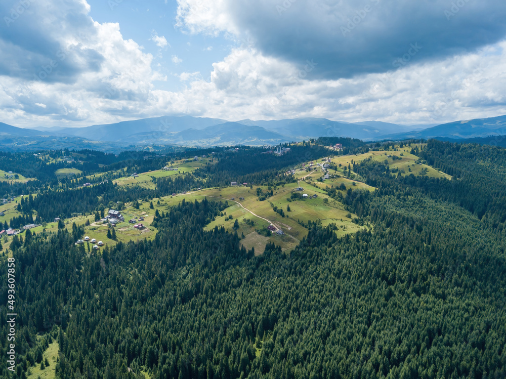 Green Ukrainian Carpathians mountains in summer. Aerial drone view.