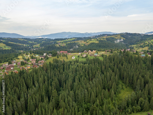 Green mountains of Ukrainian Carpathians in summer. Aerial drone view.