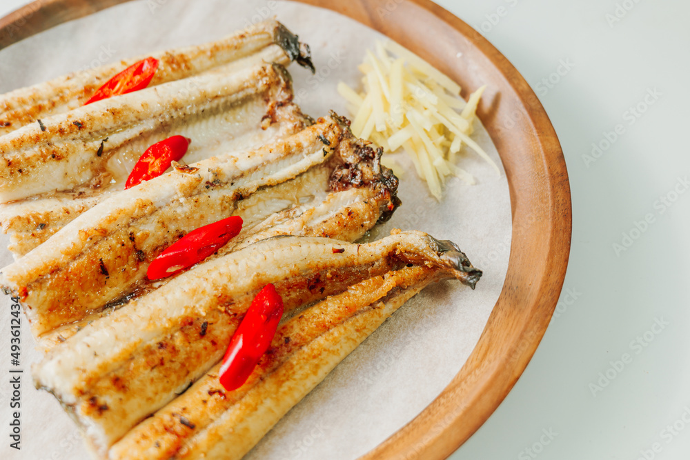 jangeogui, Cleaned eel are seasoned with salt, soy sauce, gochujang, and others to taste, and then grilled. Eel is rich in vitamins A, B, and C, which fight aging and keep the skin healthy and youthfu jangeogui, Cleaned eel are seasoned with salt, soy sauce, gochujang, and others to taste, and then grilled. Eel is rich in vitamins A, B, and C, which fight aging and keep the skin healthy and youthfu