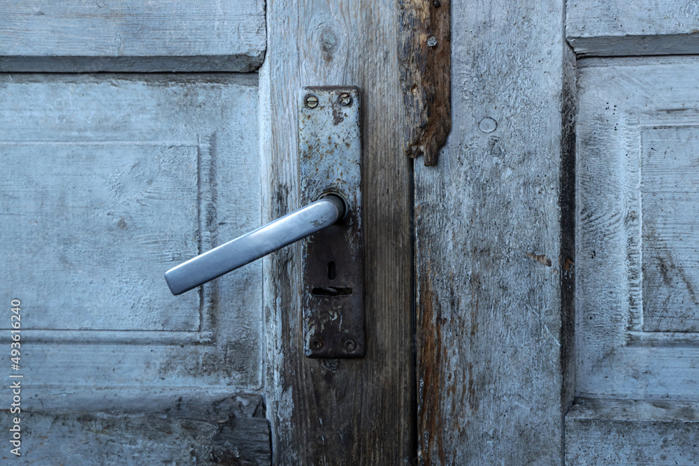 Old rusty door lock and handle