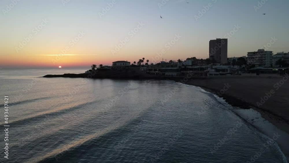 The day begins on the beach. Aerial Views from Playa del Arenal, Javea, Marina Alta in Alicante, Spain The day begins on the beach. Aerial Views from Playa del Arenal, Javea, Marina Alta in Alicante, Spain