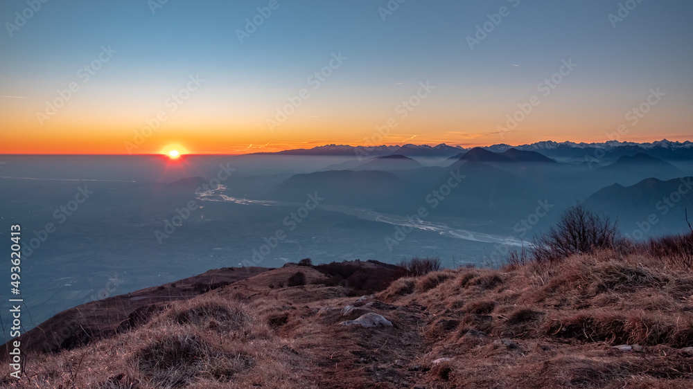 Winter sunset from an alpine peak of Friuli-Venezia Giulia
