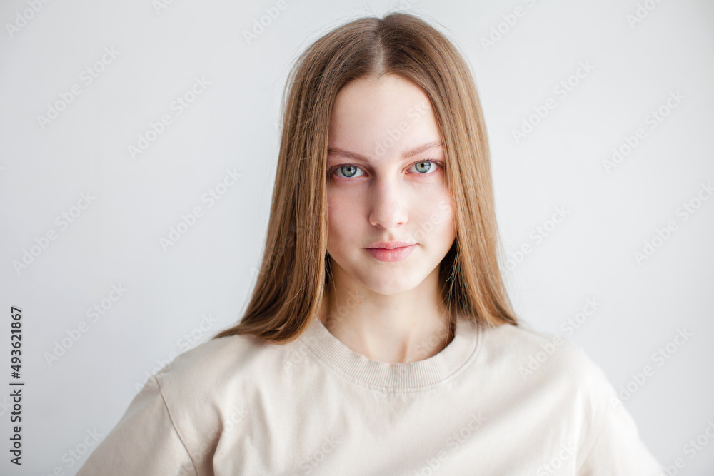 Portrait of young beautiful cute cheerful girl smiling over white background Portrait of young beautiful cute cheerful girl smiling over white background