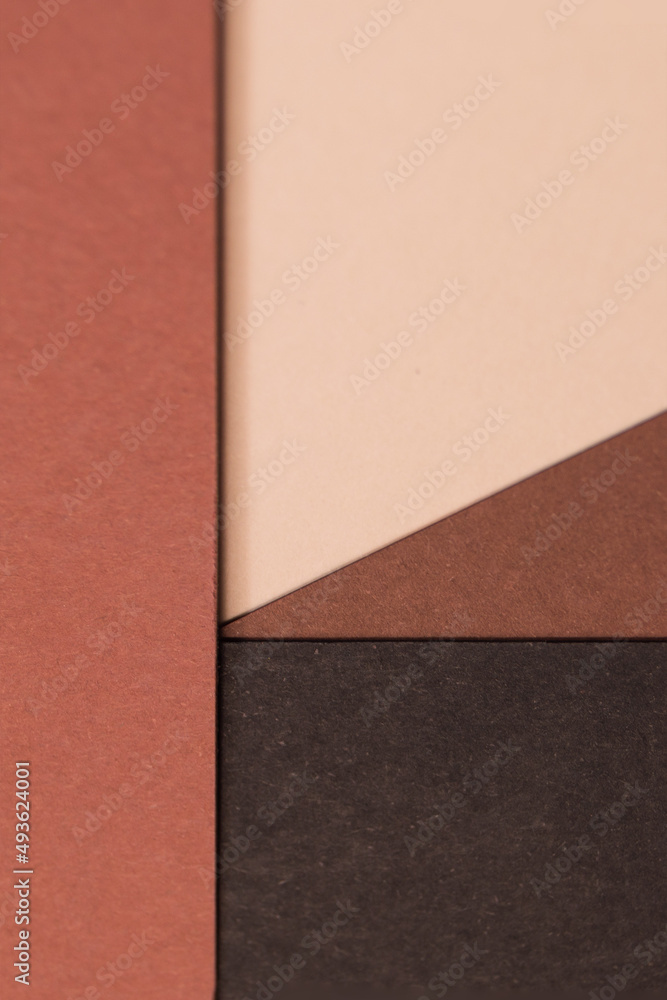 Shades of brown and black cardboard close-up of the background Shades of brown and black cardboard close-up of the background