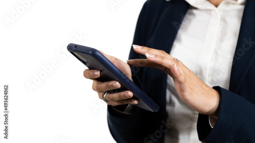latin business woman with cell phone in hand on white background