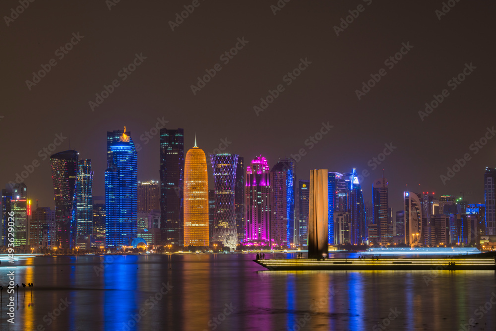 Fototapeta premium Doha,Qatar- December 23,2019 : Night view of Skyline,Doha's Financial District (West Bay).