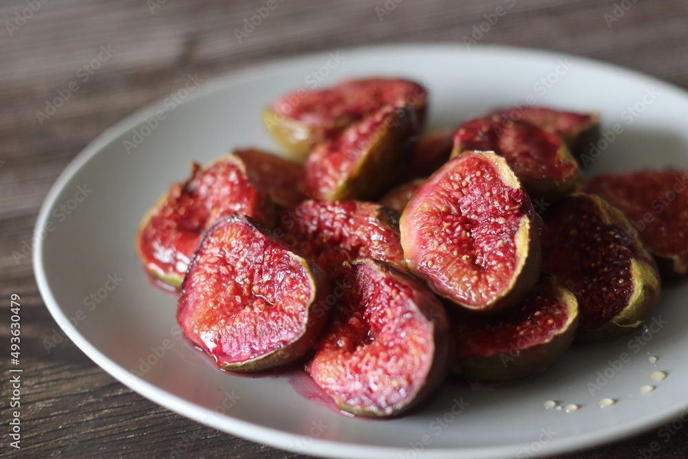 Roasted Fig halves served with a drizzle of honey