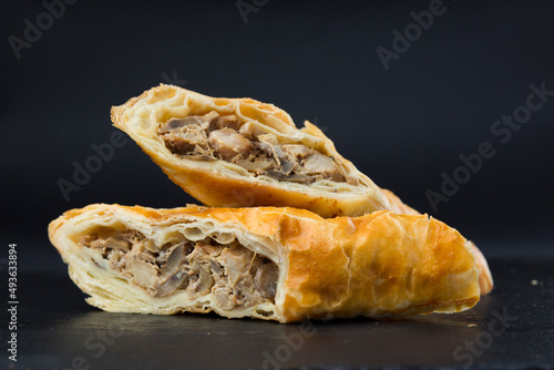 Sandwiches roll with meat. Photograph of food on a light background.