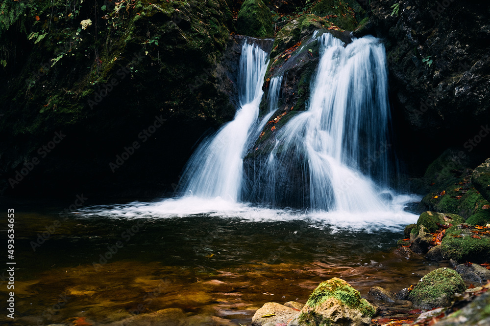 Obraz premium Waterfall on a mountain river.