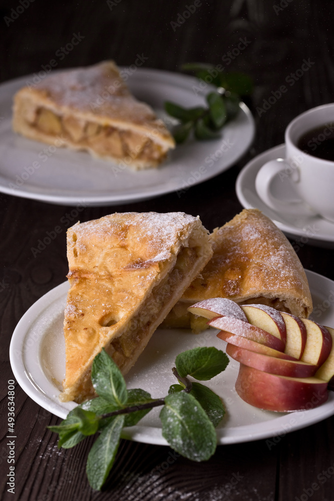 Apple pie with mint, sweetness. Food photography, dark background Apple pie with mint, sweetness. Food photography, dark background