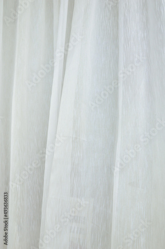 Background of white voile curtain pleated layers photo