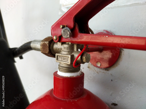a fire extinguisher or what is called an APAR is a tool to extinguish a fire when a fire occurs, in the form of a tube containing powder as an extinguishing medium. photo
