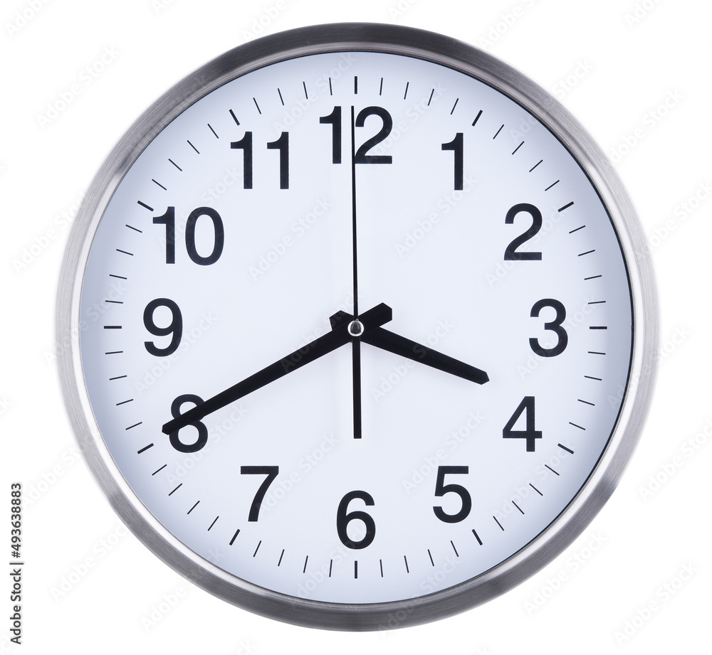 A wall clock isolated on white background A wall clock isolated on white background