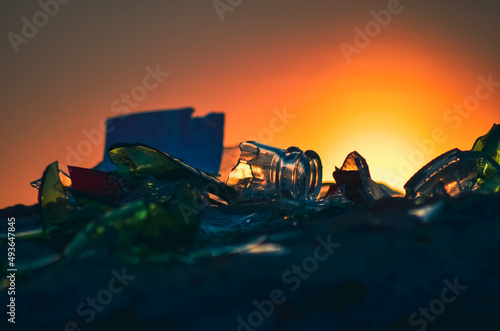 broken glasses on sunrise over the mountains