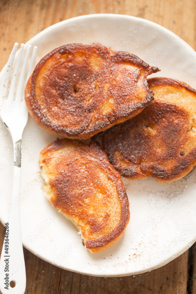 Pancakes with apples, cinnamon and icing sugar Pancakes with apples, cinnamon and icing sugar