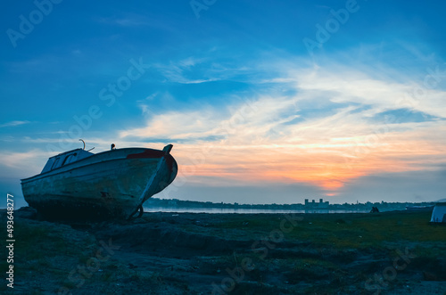 fishing boat at sunset © Aytug Bayer