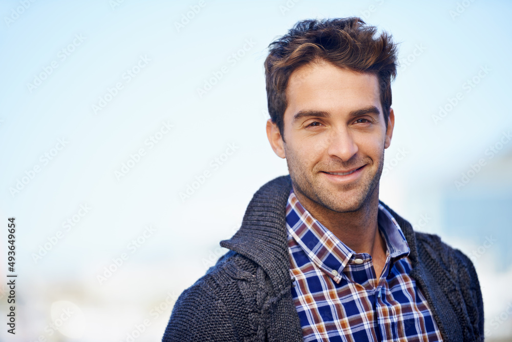 Wearing my happy today. Shot of a handsome young man spending a day outdoors. Wearing my happy today. Shot of a handsome young man spending a day outdoors.