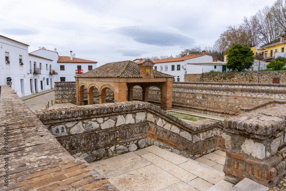 historic public laundry installation and fountain in the city square of Aracena