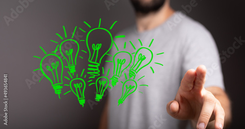 hand holding eco light bulb...