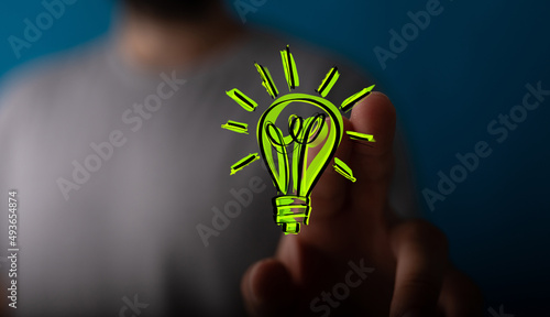 hand holding eco light bulb...