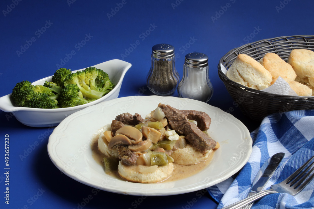 Steak Strips and Vegetables Over Hot Buttered Biscuits Steak Strips and Vegetables Over Hot Buttered Biscuits