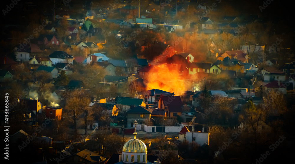 Burning house in the city of Kyiv cityscape