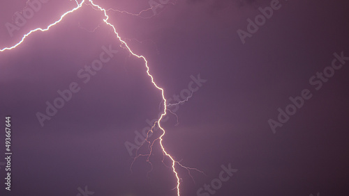 Thunder and lightning light up the sky