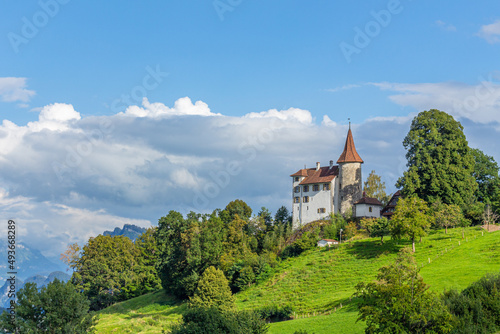 house on a green hill Pilatus Switzerland