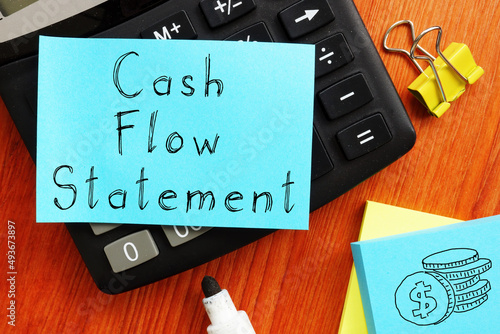 Cash flow statement is shown on the photo using the text