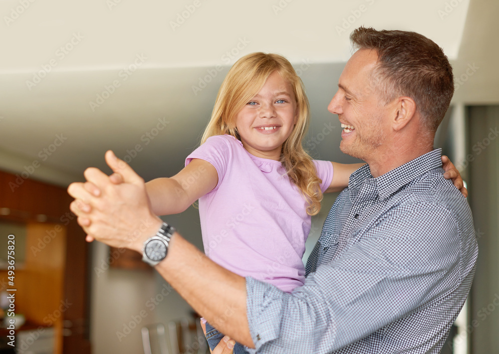 Dancing with Dad. Portrait of a father and daughter enjoying a dance together. Dancing with Dad. Portrait of a father and daughter enjoying a dance together.