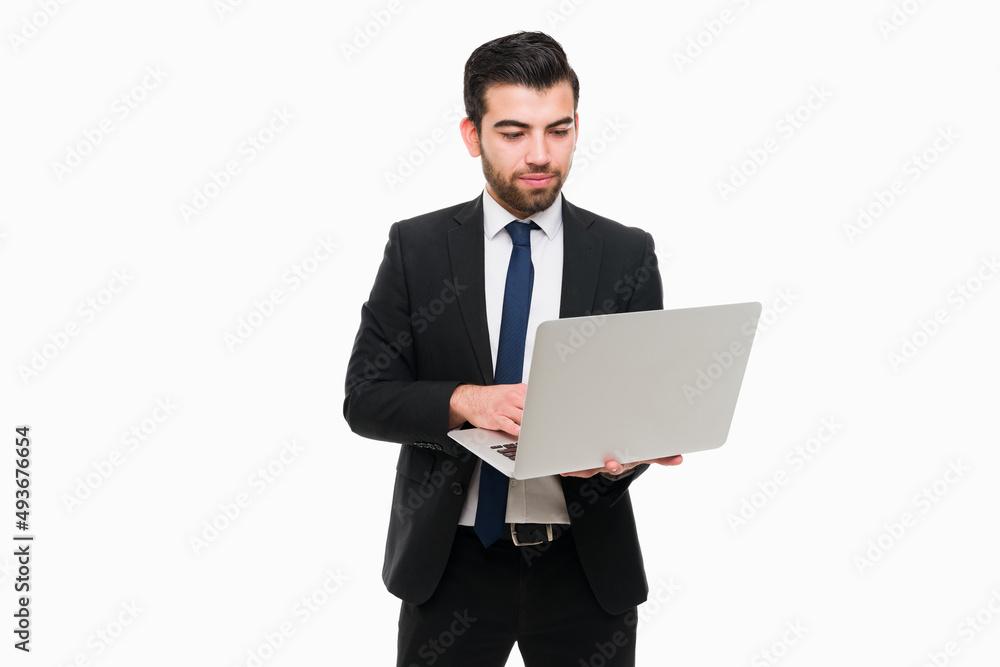 Hispanic lawyer using the computer Hispanic lawyer using the computer