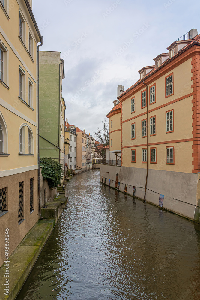 Houses of Prague, standing on the canals of the Vltava. Water streets. Corner of the Prague Venice