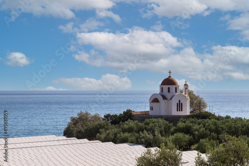 Fototapeta Naklejka Na Ścianę i Meble -  Summer landscape of Crete island in Greece in Europe. Coast in the Larapetra region. In the background is a sunny sky with clouds.