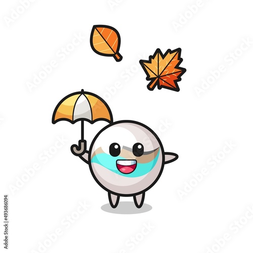 cartoon of the cute marble toy holding an umbrella in autumn