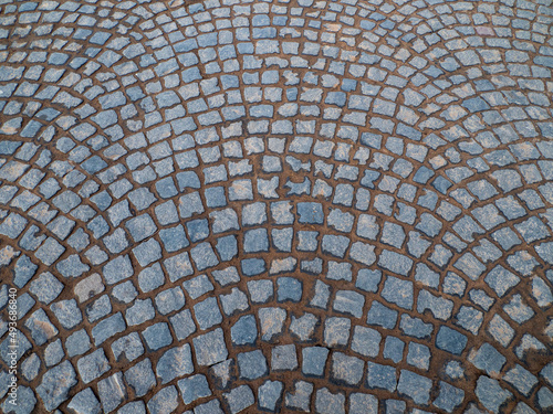 The old granite cobblestone pavement background