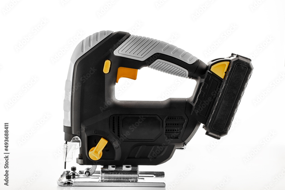 Powerful electric jigsaw on a white background Powerful electric jigsaw on a white background