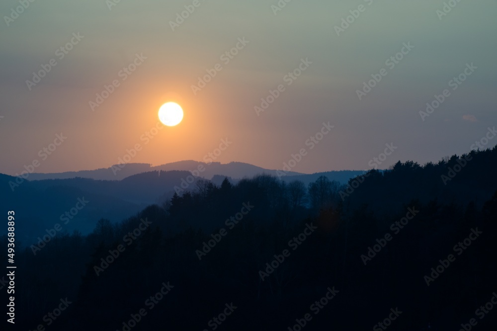 Orange sunset over landscape background Orange sunset over landscape background