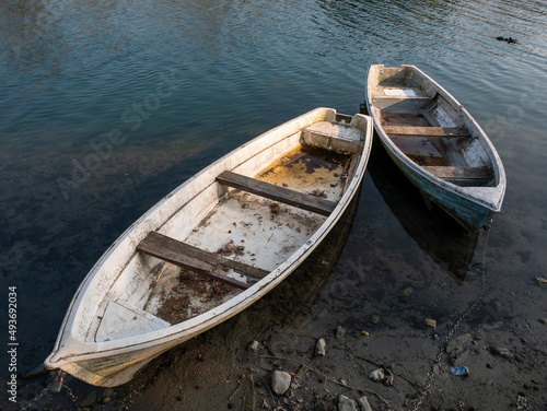 Old boat om adda river in Lombardy