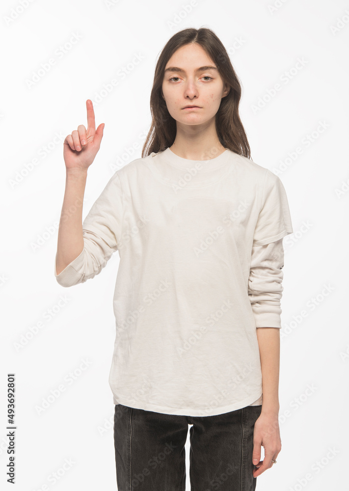 half-length portrait of a young Ukrainian girl who shows the number with her hands on a white background
half-length portrait of a young Ukrainian girl who shows the number with her hands on a white background
