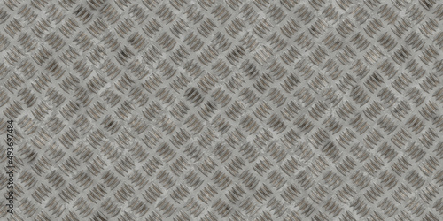 Seamless steel floor plate with diamond pattern 3D render. A tileable high resolution metal texture, perfect for backdrops and backgrounds.