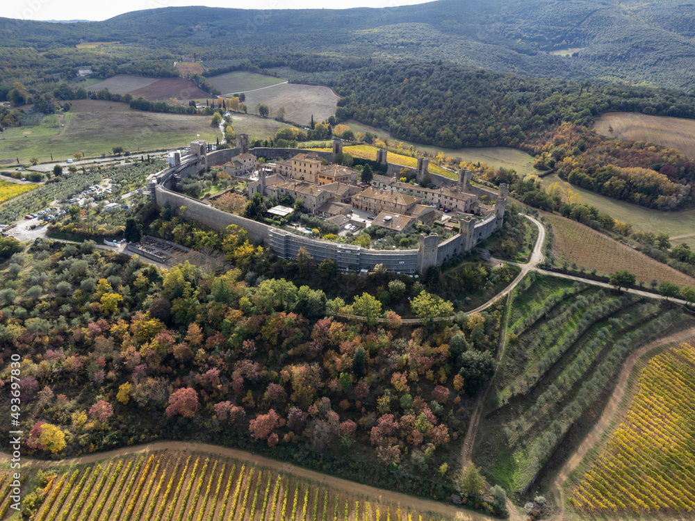 Aeriel view on medieval fortress town on hilltop Monteriggione in Tuscany, Italy