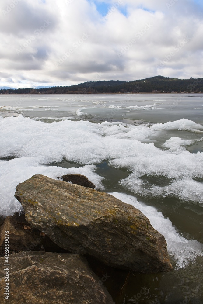 Boulders by the frozen lake.