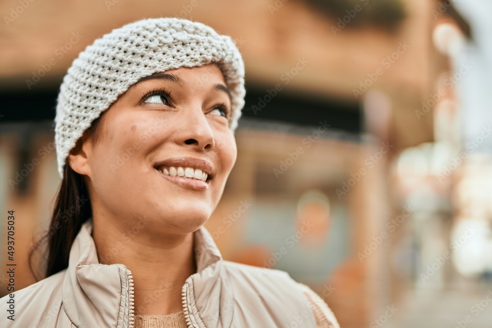 Young latin woman smiling happy standing at the city. Young latin woman smiling happy standing at the city.