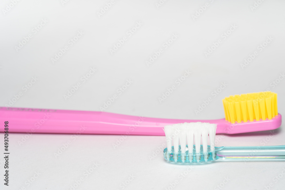 2 different toothbrush. Toothbrush closeup on white background. 2 different toothbrush. Toothbrush closeup on white background.