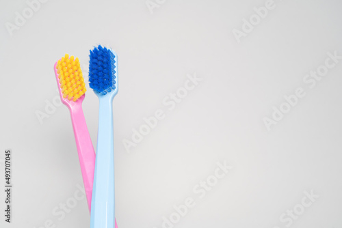 A conceptual of a couple toothbrush in love. Toothbrushes convey the human relationship between a man and a woman.